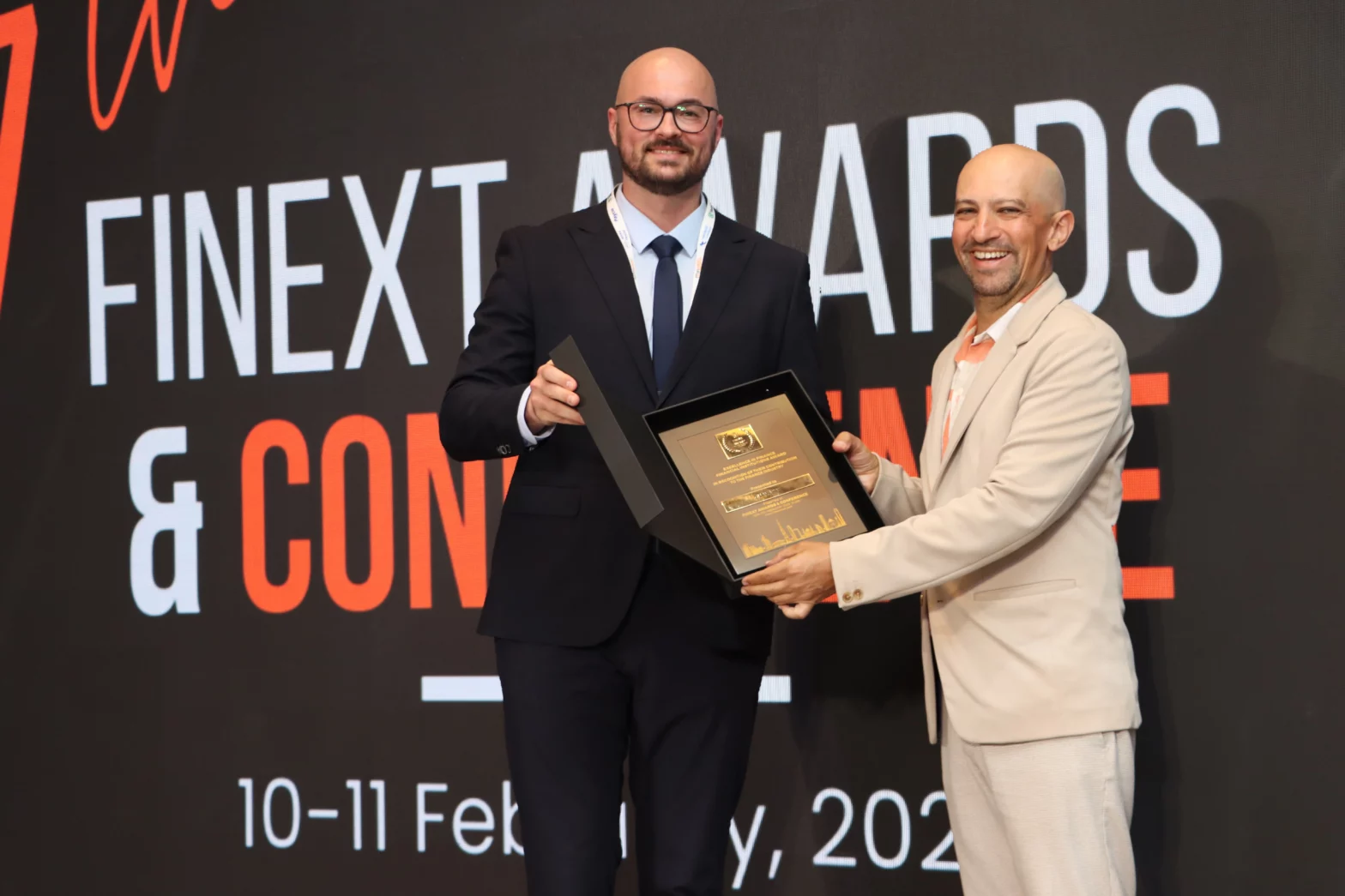 Nikita Guliaev Wins Excellence in Finance: Compliance and Regulatory Affairs Award at Finext Conference